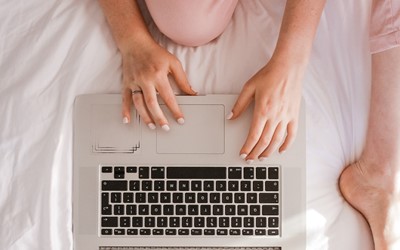 Woman using laptop at home