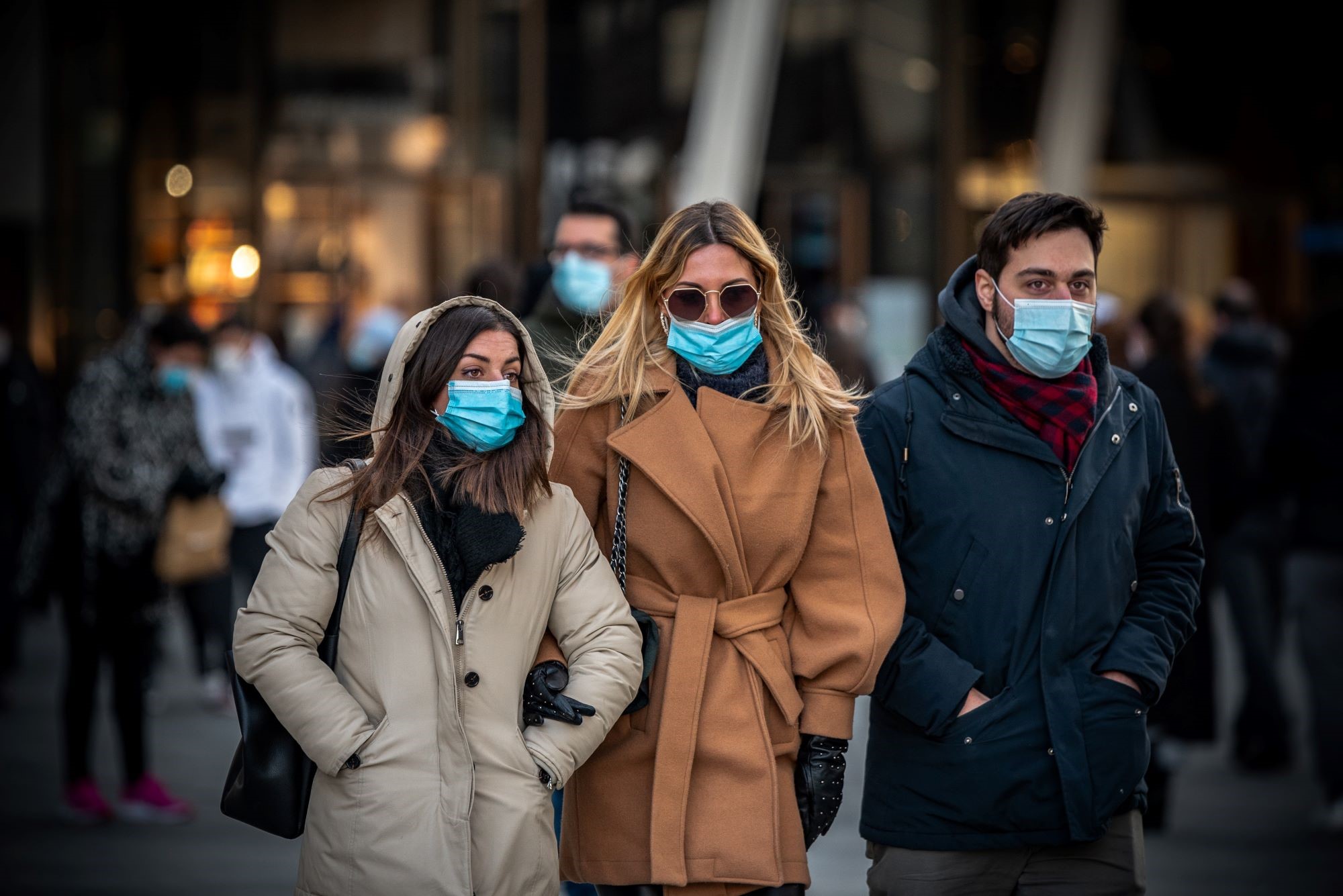 People wearing masks in city