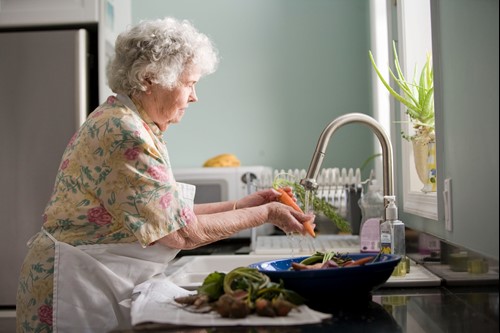 woman cooking alone at home