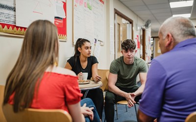 young people talking in a group