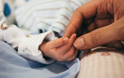 Mother And Child Holding Hands