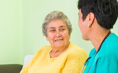 Woman with healthcare worker